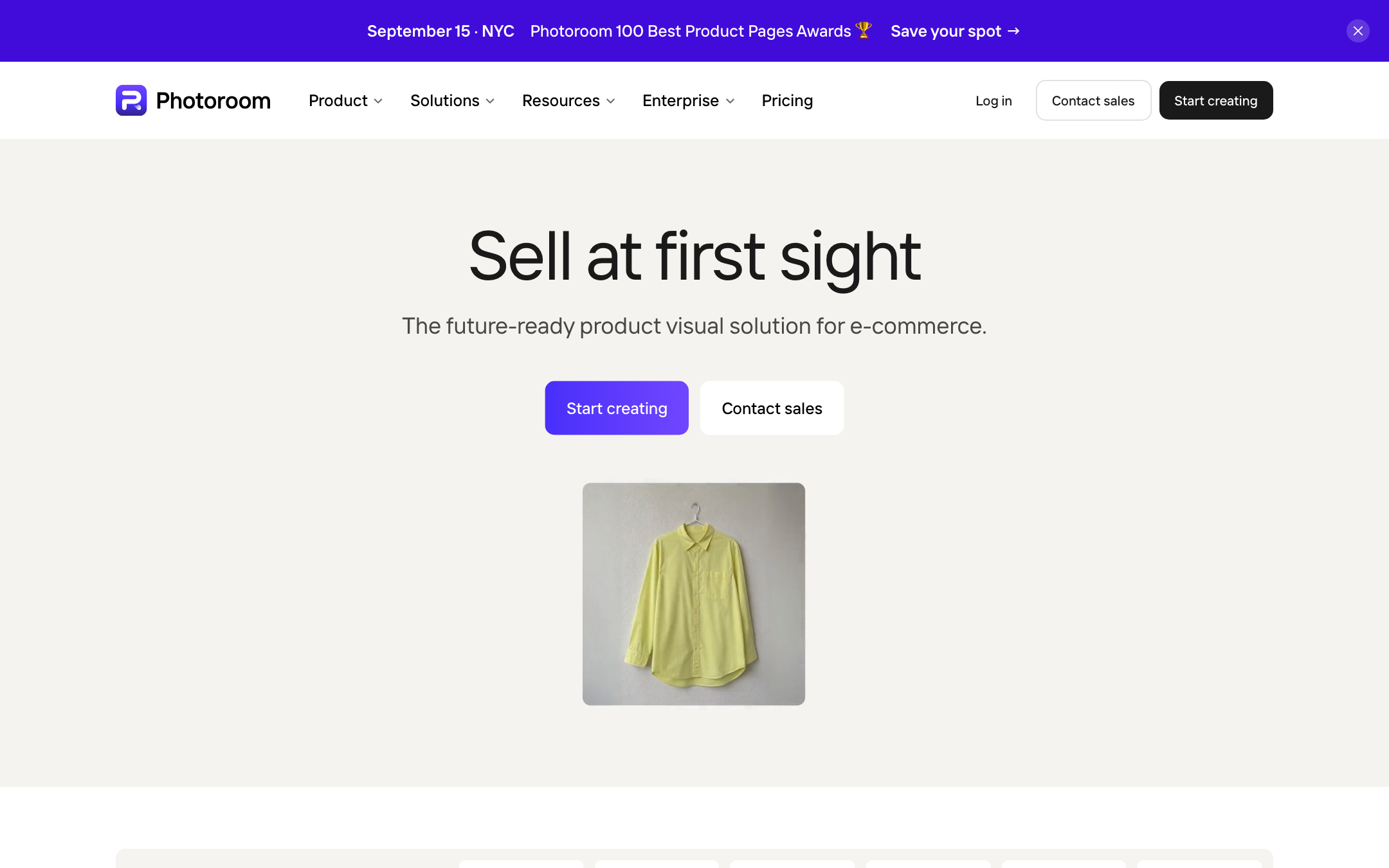 Photoroom homepage: Sell at first sight, Start creating, yellow shirt product photo, NYC awards banner
